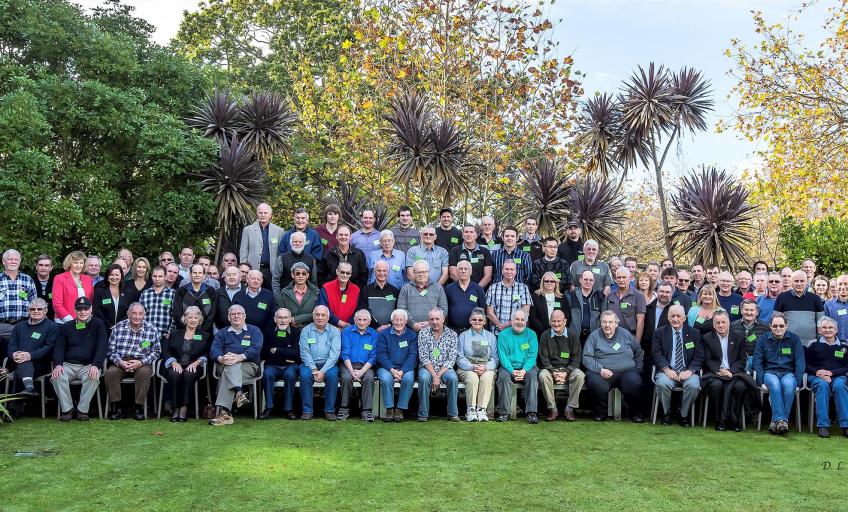 Conference delegates and attendees pause for group photo